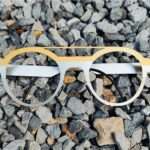 handgefertigte unikat edelstahbrille. auf kundenwunsch einzig kreiert und im bi-color, double bridge stil, handgefertigt nach art des hauses.
